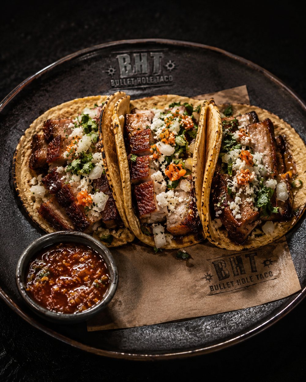 This week's smoked pork belly tacos with onion, cilantro, queso fresco, and salsa